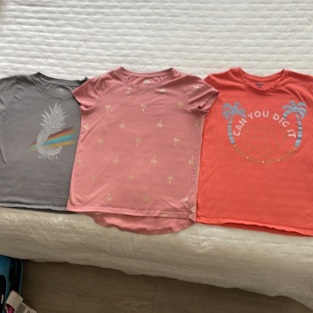 Girls T-shirts. 2 Old Navy and 1 O’Neill. Size M/8